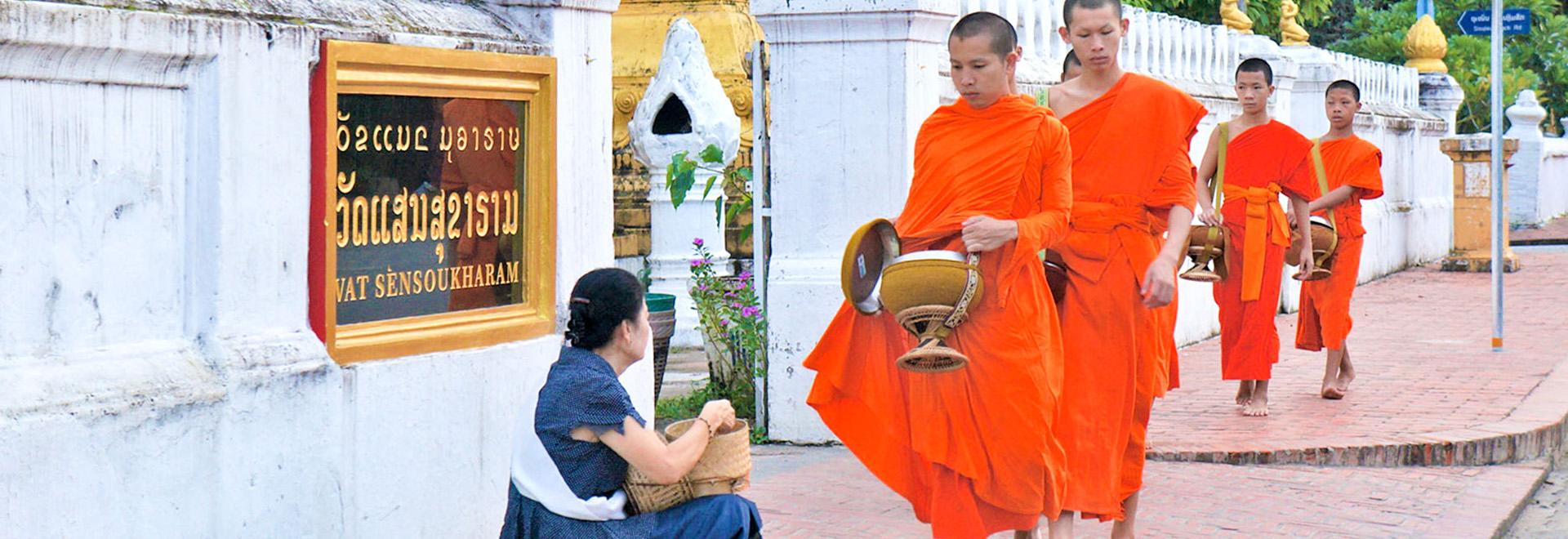 Alms giving ritual in Laos